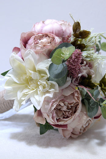 Blush Wedding Handing Flowers